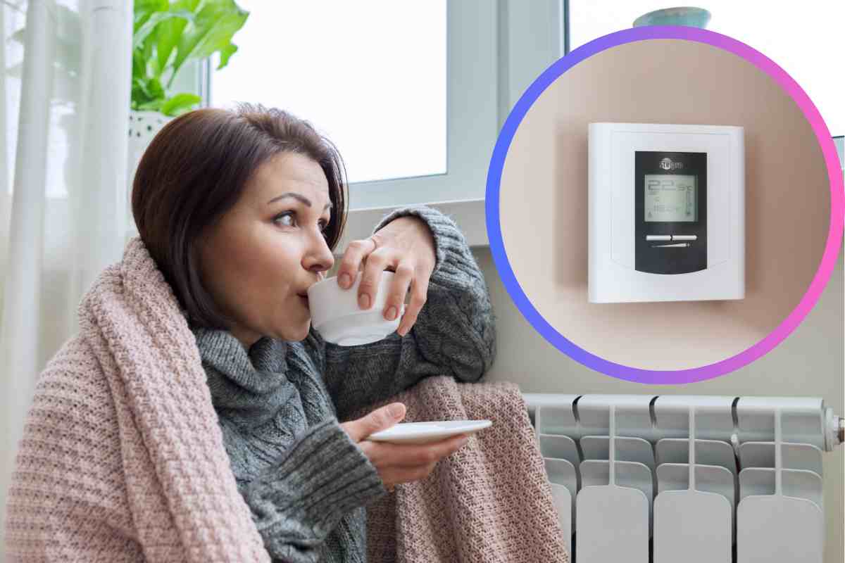 Donna che beve bevanda calda in casa al caldo